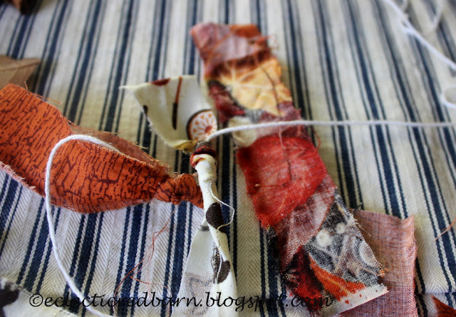 Eclectic Red Barn: Tying fabric strips to thread on fall Garland