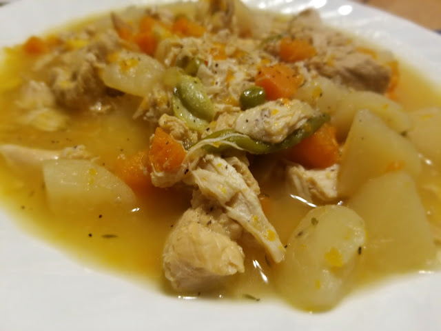 Chicken and Vegetables cooked in broth on a plate