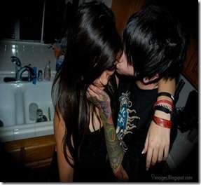 Emo-couple-hug-kissing-scene-tattoos-emo-boy-girl