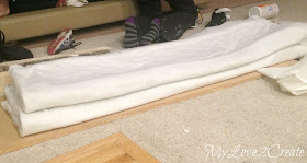 Repurpose and old crib mattress for bench padding