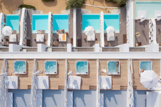 nikki beach porto heli resort & spa pool aerial view