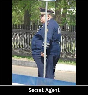 fat policeman behind the street sign secret agent