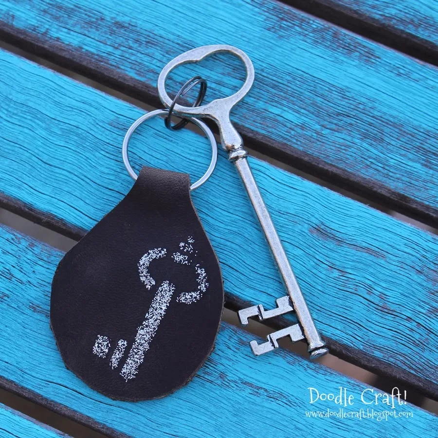 http://www.doodlecraftblog.com/2014/02/glitter-stencil-leather-key-fob.html