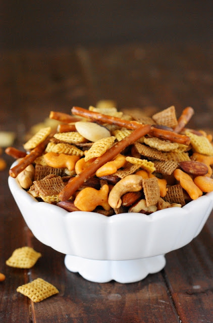 The next time that craving for a salty-crunchy snack hits, skip the grocery story aisle and whip up some classic Homemade Chex Mix yourself!  www.thekitchenismyplayground.com