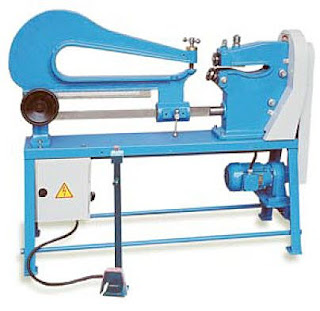 circle cutting machine operation in sheet metal manufacturing workshop