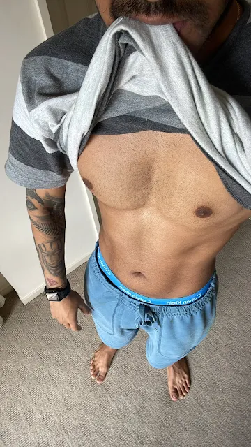 Men Underwear Waistband Peeking Out of Joggers