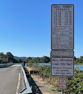 Sign showing fares to take the Westport Ferry across the Columbia River