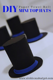 How SUPER CUTE are these DIY mini top hats from www.abrideonabudget.com? They're made from an empty paper towel roll too! Check out the link to find out how to make your own cardboard top hats!