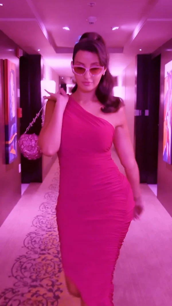 Nora Fatehi pink dress curvy body