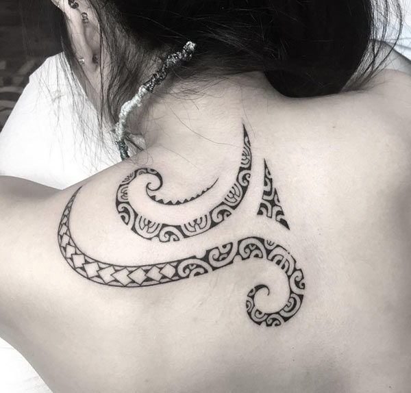 The tattoo is really beautiful on the girl back polynesian tribal tattoos