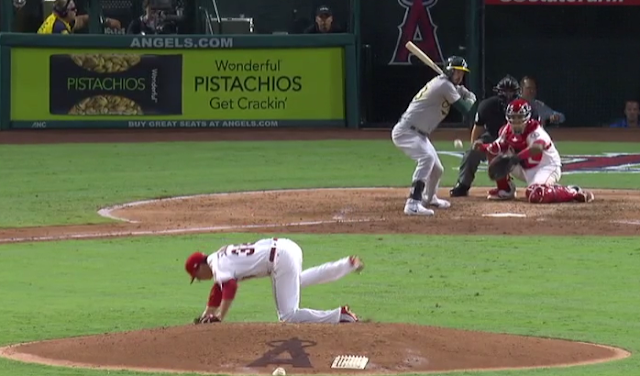 Troy Scribner slips off mound