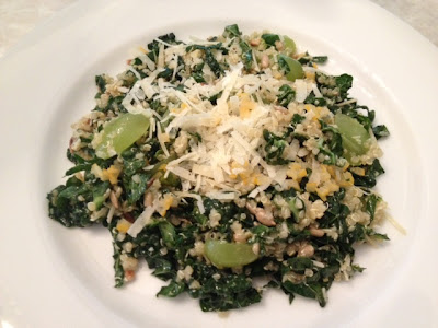 Kale salad with quinoa, grapes and manchego cheese