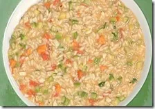 Risotto con capesante, zucchine e pomodori del piennolo