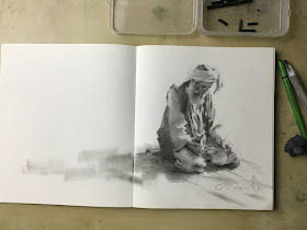 07-Taking-a-moment-Charcoal-Portraits-Kan-Srijira-www-designstack-co