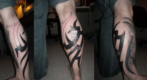 Tribal leg sleeve tattoo