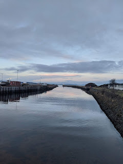 The River Nairn from the harbour with a view out to the sea