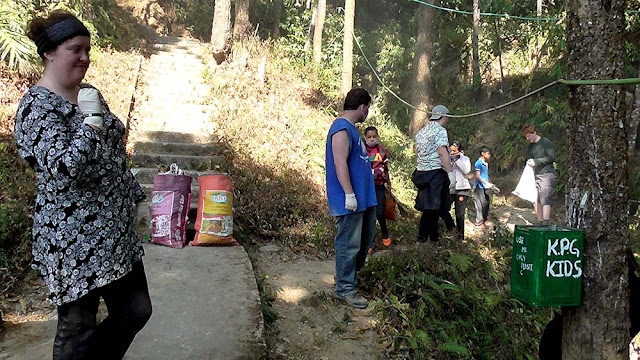 CHILDREN WITH FOREIGNERS CLEAN THE LOCALITY IN KALIMPONG A novel approach