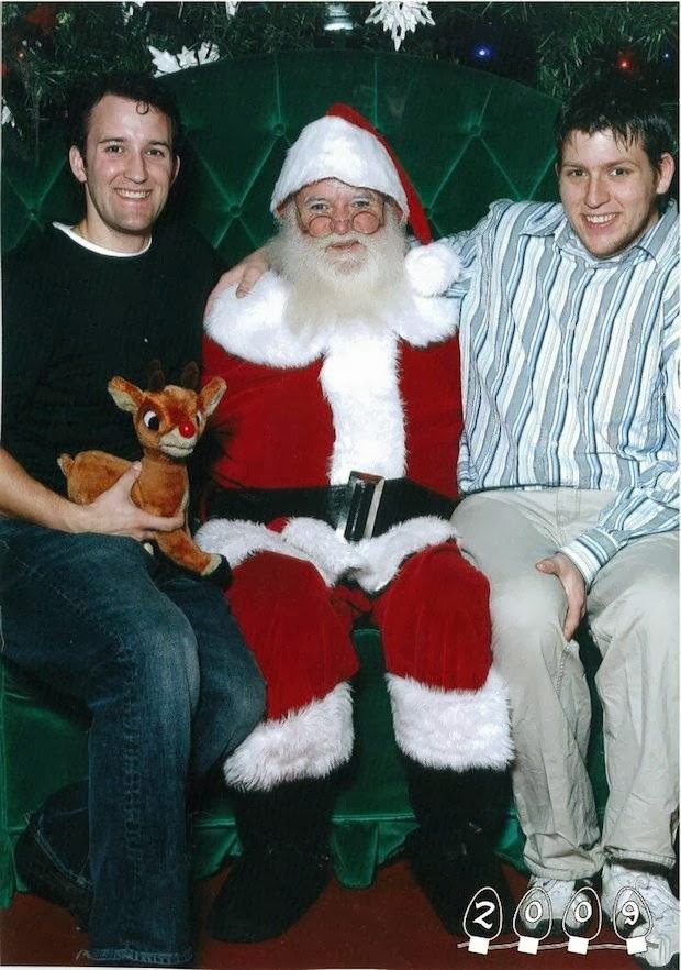 Two Brothers Smile With Santa for 34 Years