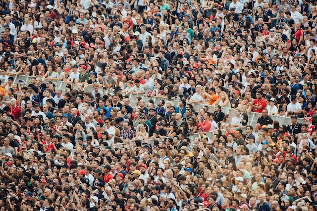 A photo of numerous people in the audience.