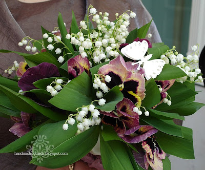 pansy wedding bouquet with butterfly Notice the butterfly