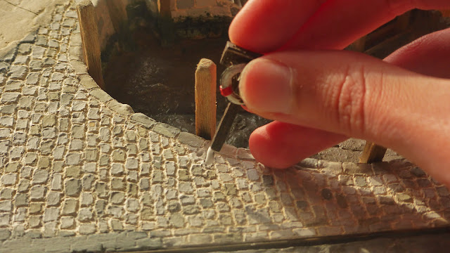 Adding a lifesaving ring to the quayside.