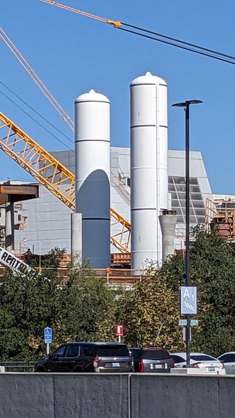 Space shuttle Endeavour's twin solid rocket motors stand tall at the construction site for the California Science Center's Samuel Oschin Air and Space Center in Los Angeles...on November 8, 2023.