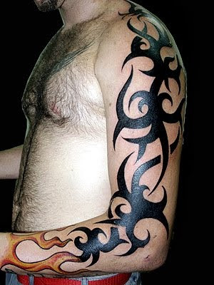 tattoo tribal sleeve and fire tattoo