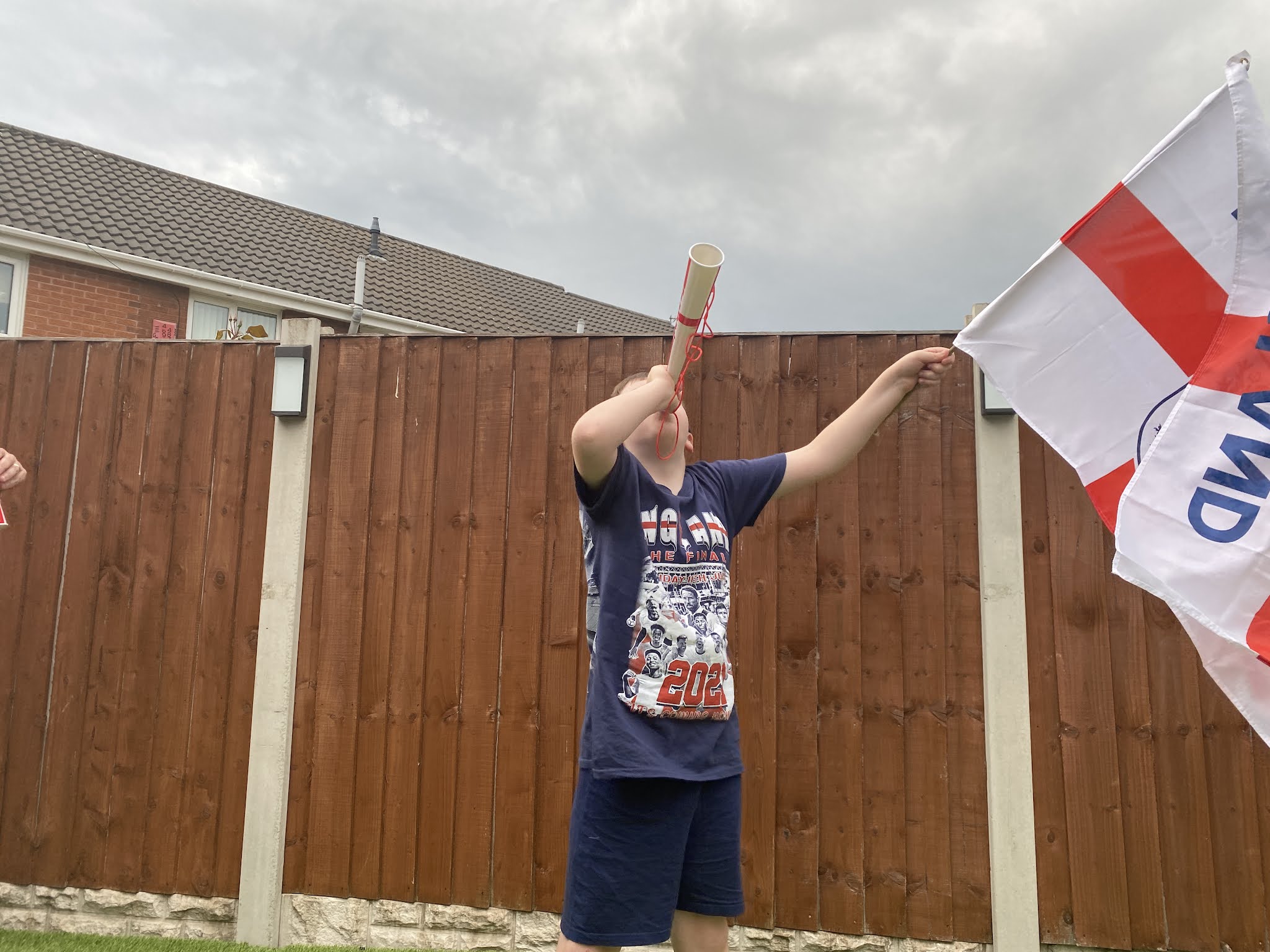 boy waving an england flag