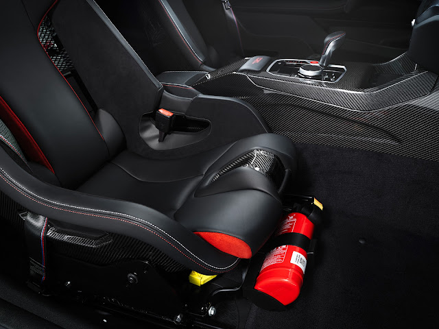 2023 BMW M4 CSL comes with the Merino leather as standard altogether with the M seat belts.