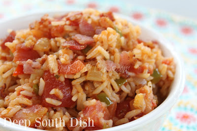 Spanish Rice - a side dish made with bacon, rice, tomatoes, the Trinity of veggies and a few simple seasonings.