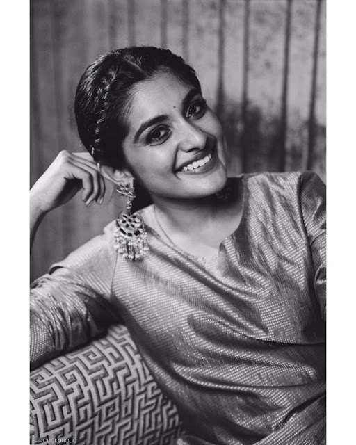 Nivetha Thomas flashing a cute smile in a recent photoshoot.