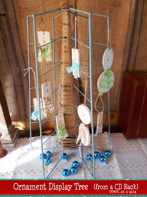Upcycling an old cd holder as a tree for displaying ornaments