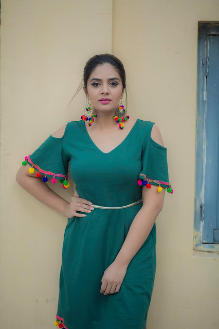Srimukhi’s elegant and stylish green outfit stills.