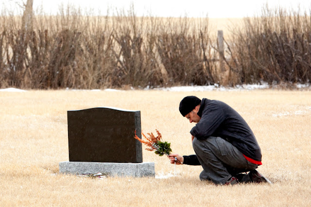 Why I Left Flowers On a Stranger’s Grave in Russia