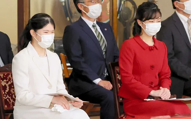 Princess Aiko wore a white ivory blazer skirt suit, Princess Kako wore a red peplum blazer and skirt suit at Autumn Party