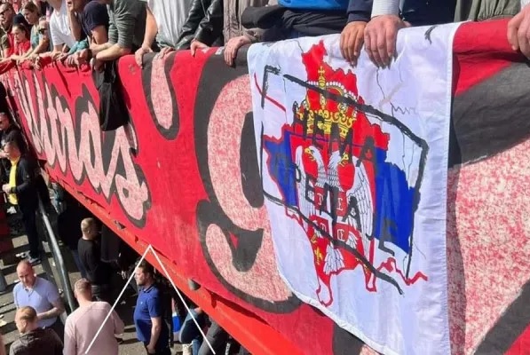 The flag of Serbia on the map of Kosovo displayed by Twente fans in the match against Sparta Rotterdam