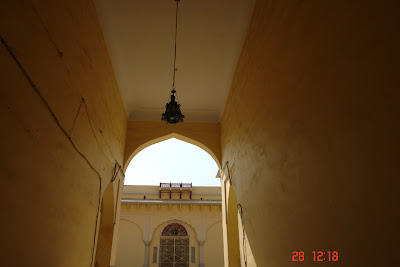 Arched doorway with a lamp