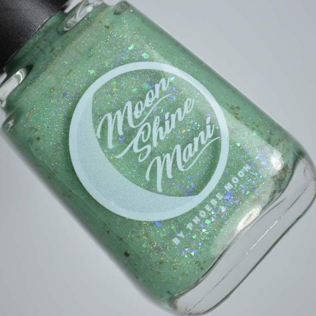 green nail polish with flakies