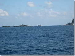 Boat on rocks at Round Island