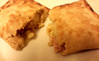 A leek and ham slice, cut open to show delicious filling. 