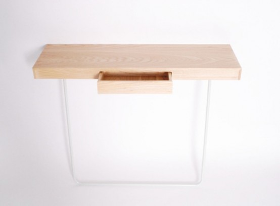 Minimalist and multifunctional work table with a secret storage locker by Daniel Schofiel-1
