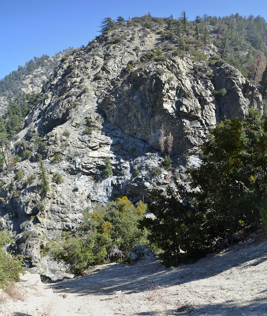 steep sand to a cliff