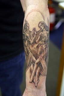 Satan / angel of death tattoo on the arm