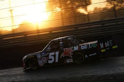 Buddy Kofoid, driver of the No. 51 Mobil 1 Toyota, drives during the NASCAR Camping World Truck Series Clean Harbors 150.