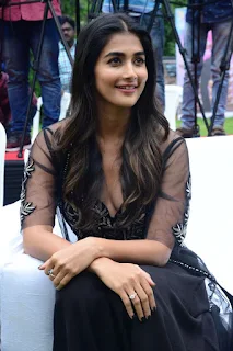 Actress Pooja Hegde Stills in black dress at Valmiki movie Press Meet