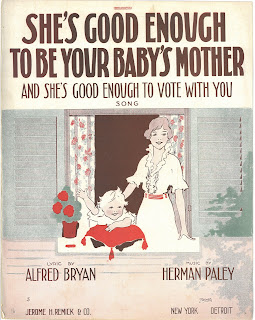 Cover of "She's Good Enough to be Your Baby's Mother and She's Good Enough to Vote with You!" The image depicts a domestic scene with a smiling woman in a dress and her rosy cheeked infant looking out a window. The child is waving.