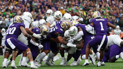 DUCKS DROP HEARTBREAKER AT UW