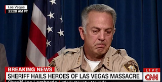 Vegas sheriff changes Mandalay massacre timeline AGAIN and says shooter DIDN'T shoot hotel security guard six minutes before rampage as he breaks down on camera