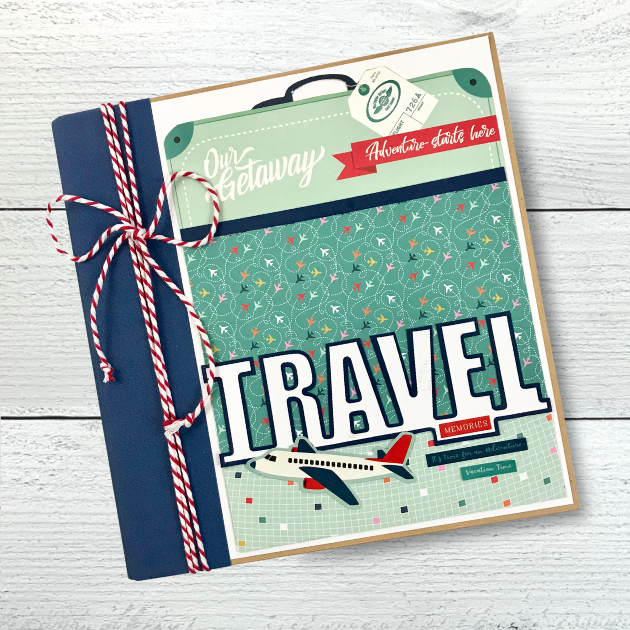 Travel Memories Scrapbook Album with an airplane and a suitcase,