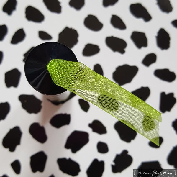 green organza ribbon trim on end of lipstick case
